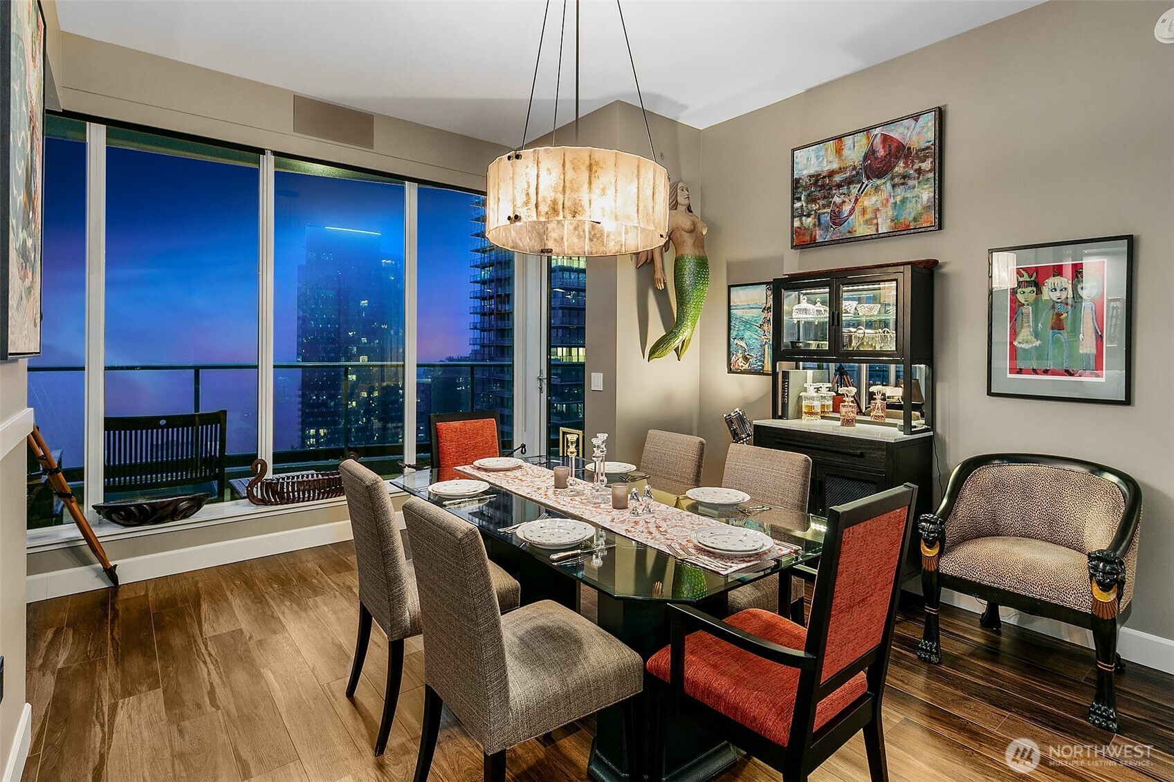 lovely dinning area with custom lighting