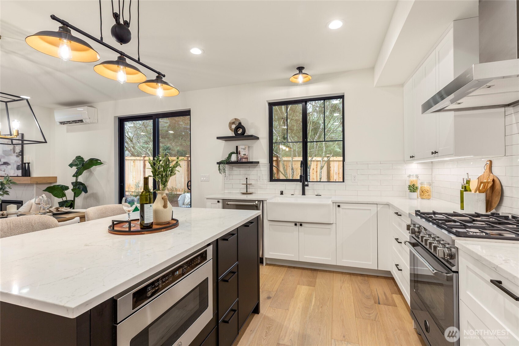 Bertazzoni microwave, oven, and dishwasher. Plenty of cabinets for storage.