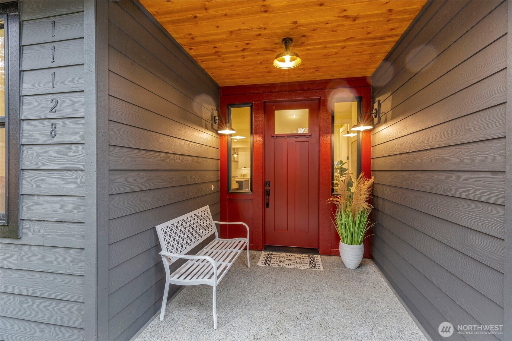 Well lit, covered front entry.