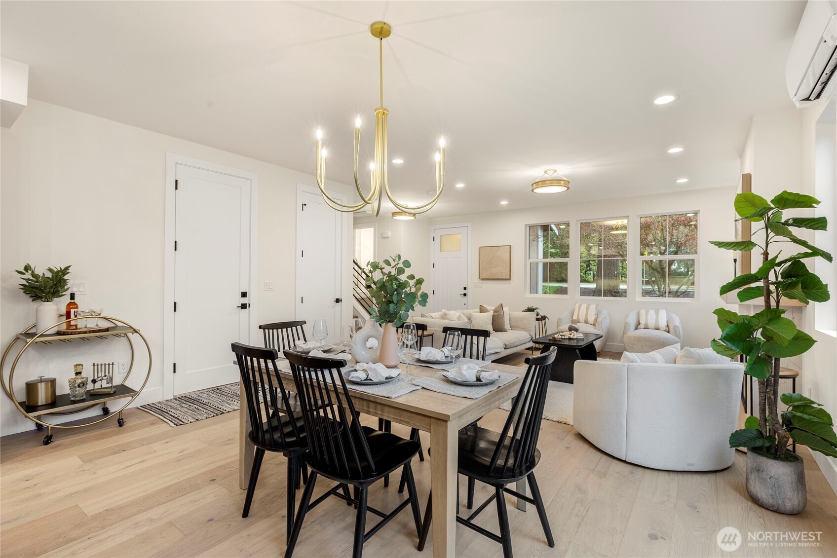 Looking towards the entry of the home you can see the dinning and living room spaces.