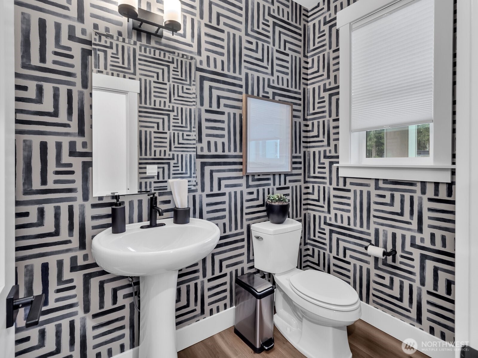 Spacious powder room on main level. Photo is of model home-Victorian plan-elements of the Chateau plan can vary