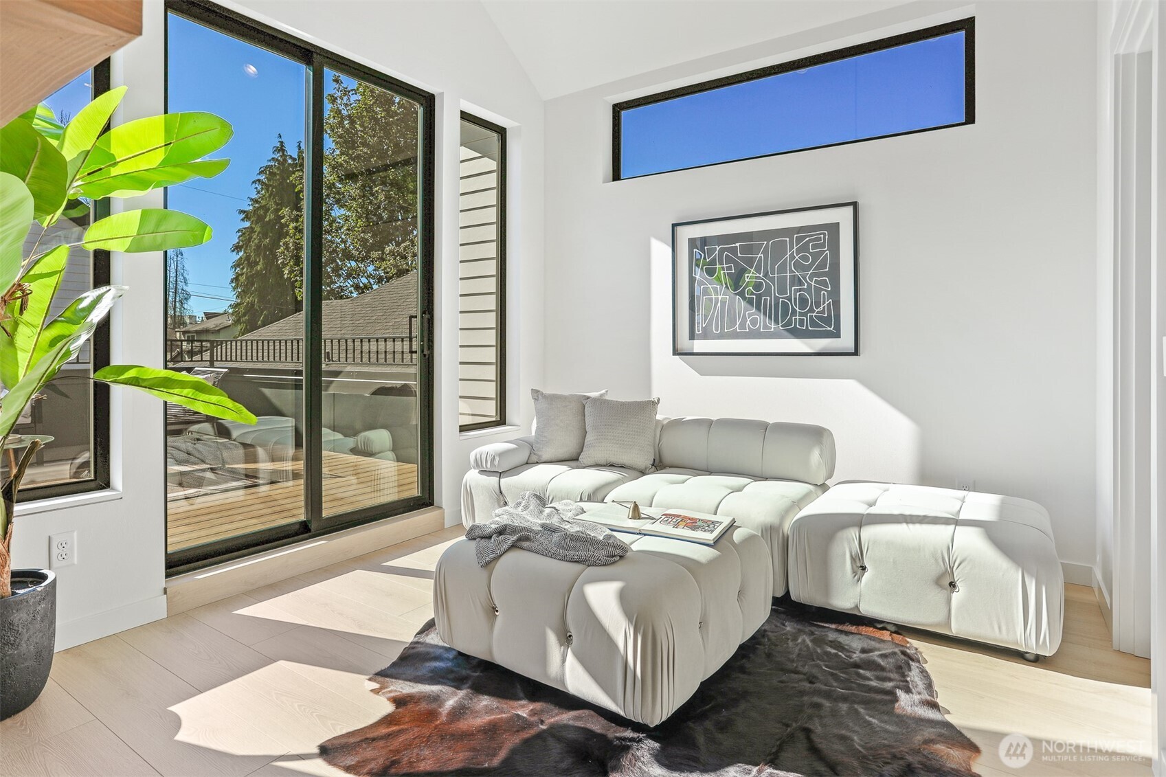 Upper Level Media Room with Vaulted Ceilings