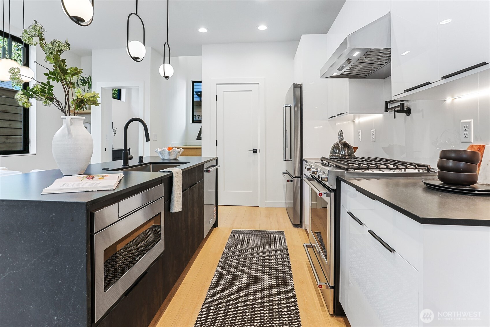 Kitchen Aid Appliance Package with Gas Cooktop, Pot Filler and Full Surround Backsplash