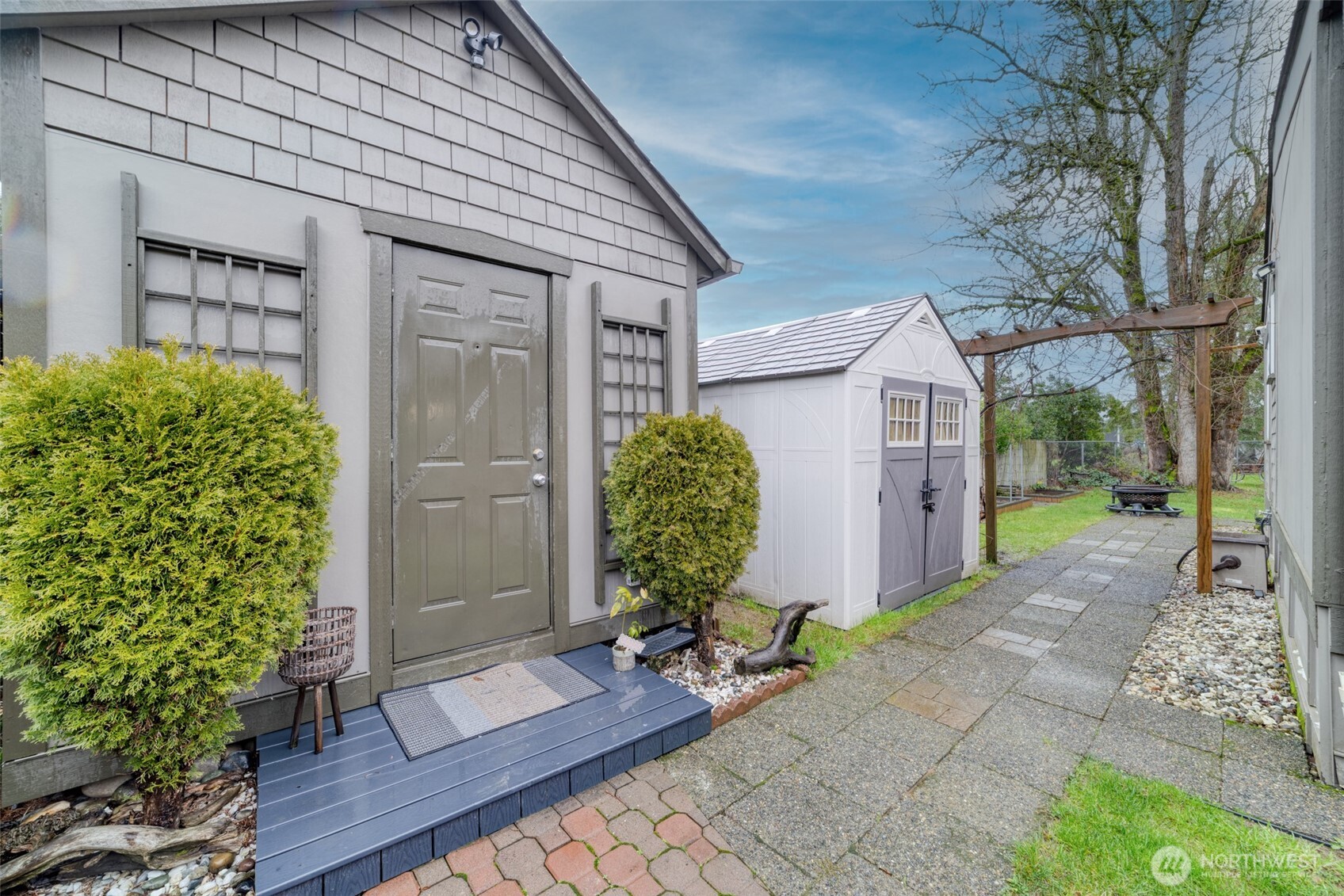 Finished outbuilding and shed providing versatile space for storage, hobbies, and additional uses