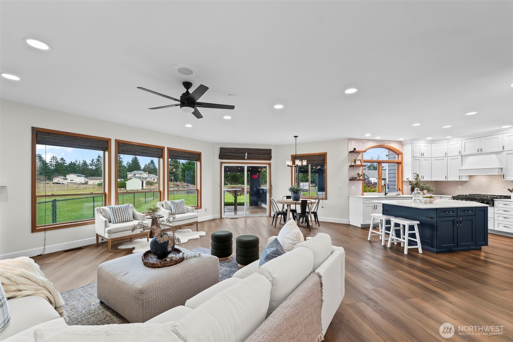 Entertaining easily flows onto the new deck, where the outdoor structures allow for year round enjoyment.