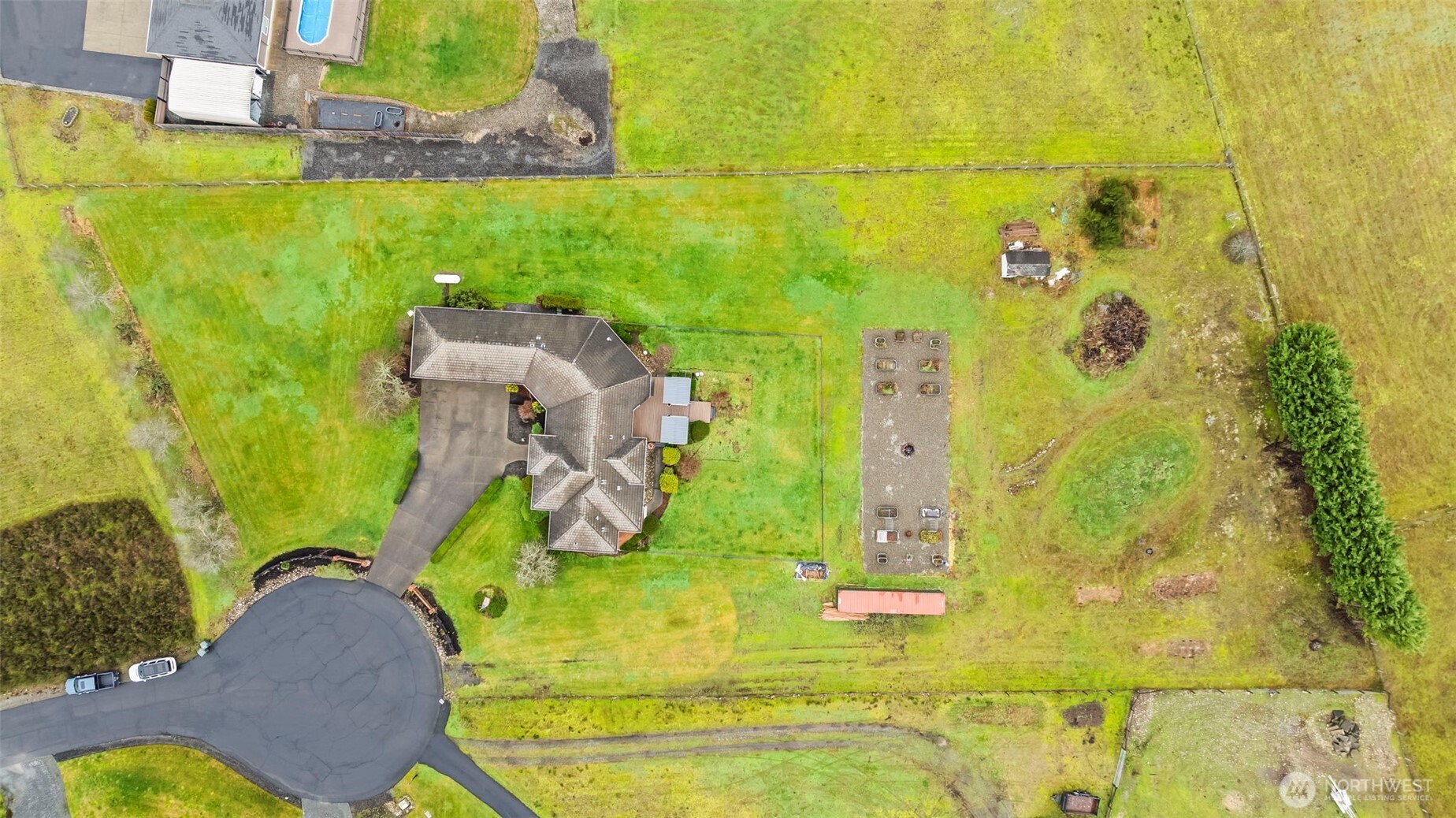 The 2+ acre property is flat and generous, allowing for the ADU or detached garage/shop of your dreams