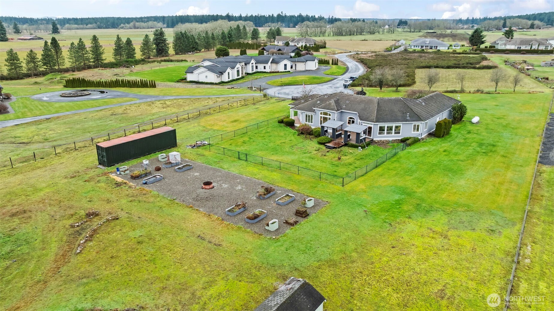 With a fully fenced inner-perimeter the yard comes dog-friendly