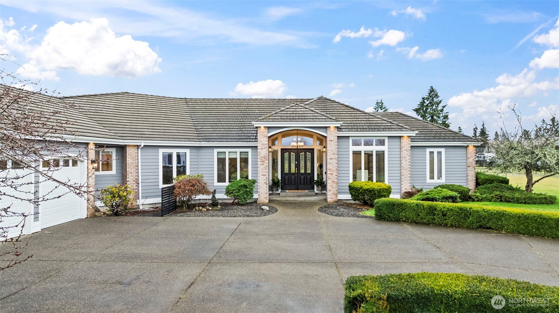 Aside from the spacious garage the driveway provides ample parking for company and toys