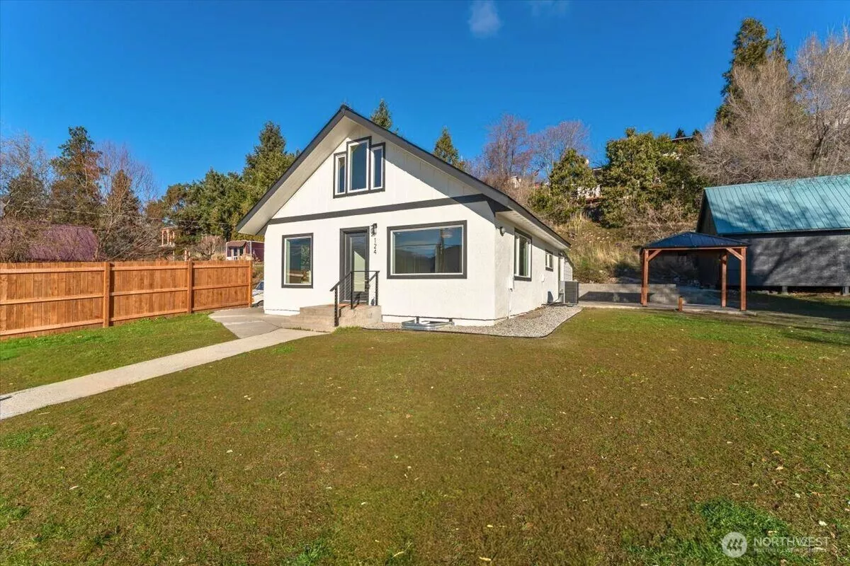 Enjoy stunning views of the lake and surrounding mountains from this home.