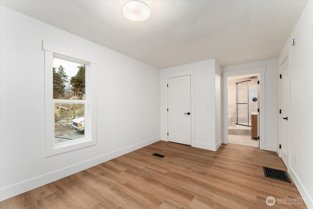 A sliding glass door off the dining and kitchen area enhances indoor-outdoor living, making it ideal for entertaining and everyday use of the kitchen. From this space, a separate door leads to the fully finished basement, featuring an additional living room, bedroom, and full bathroom.