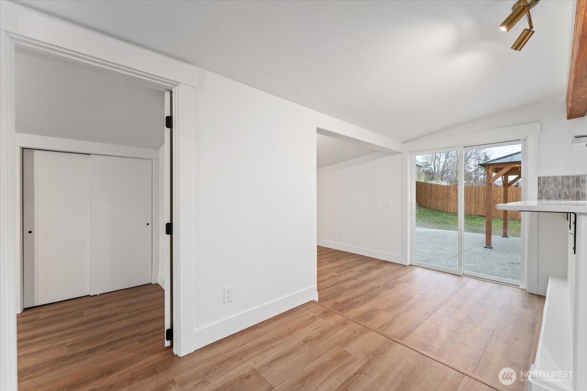 The primary bedroom features the same updated finishes found throughout the home, creating a modern, cohesive, and inviting retreat.