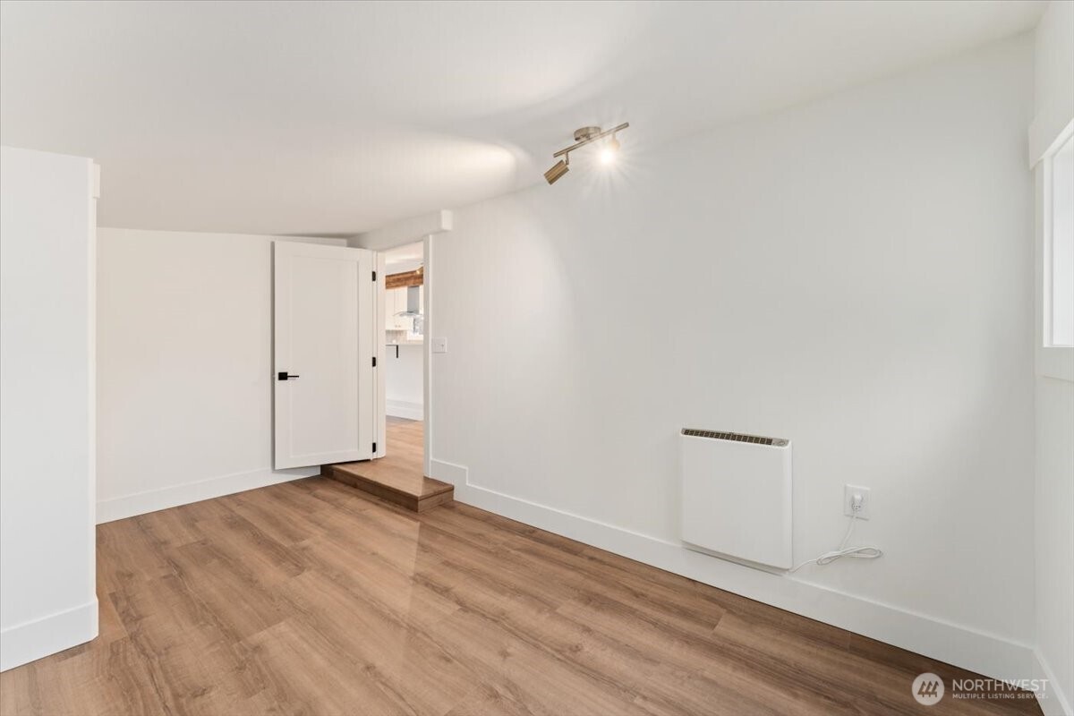 The primary bedroom includes a private en-suite bathroom for added comfort and convenience.