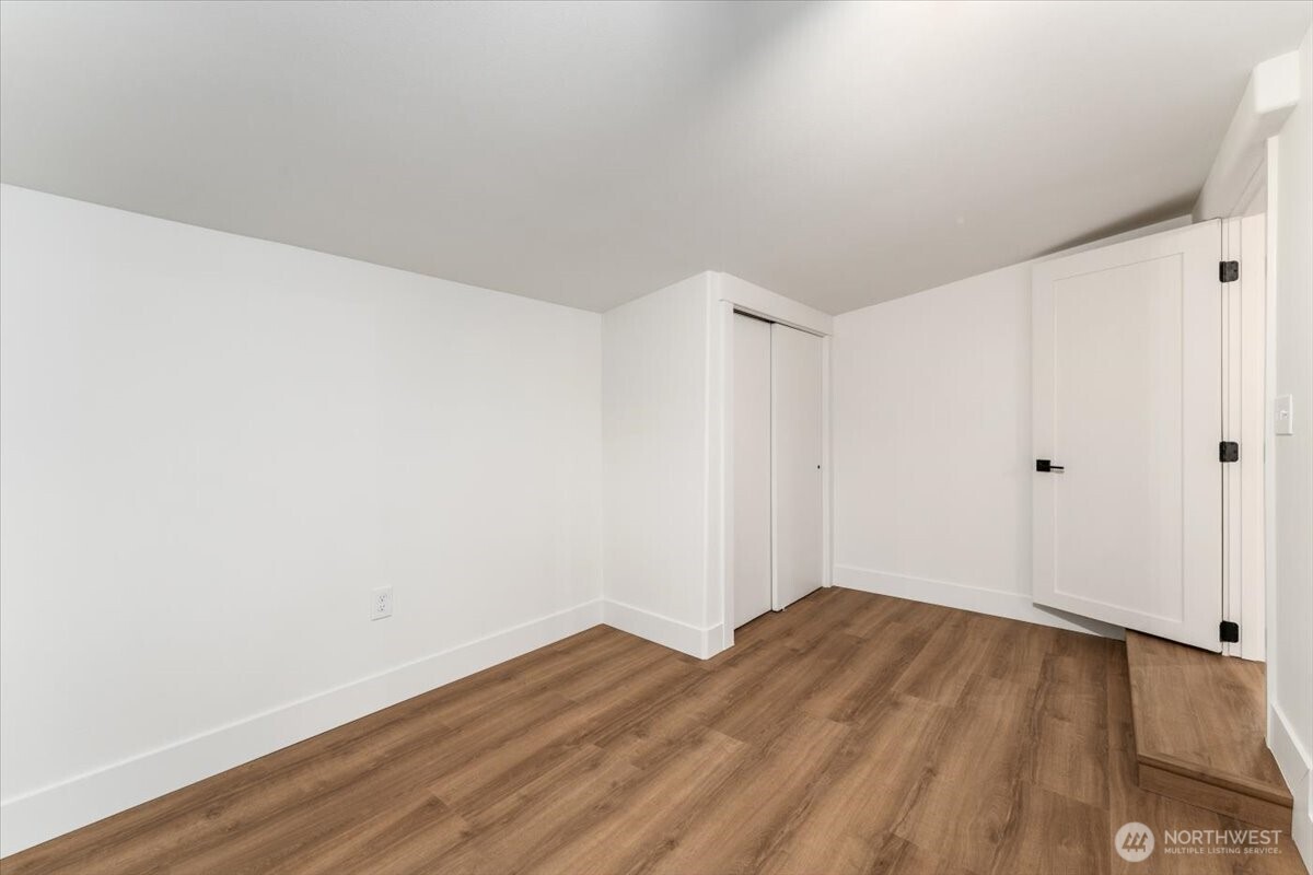 Unwind in the spacious soaker tub, complemented by a separate standing shower for convenience.