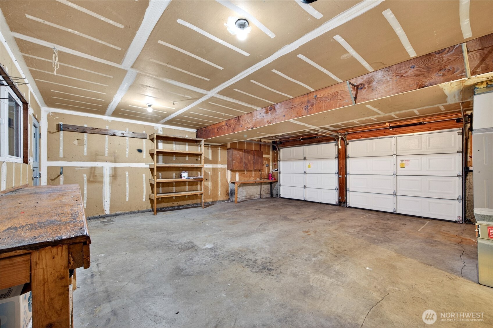Spacious 2 car garage and workshop/bench area