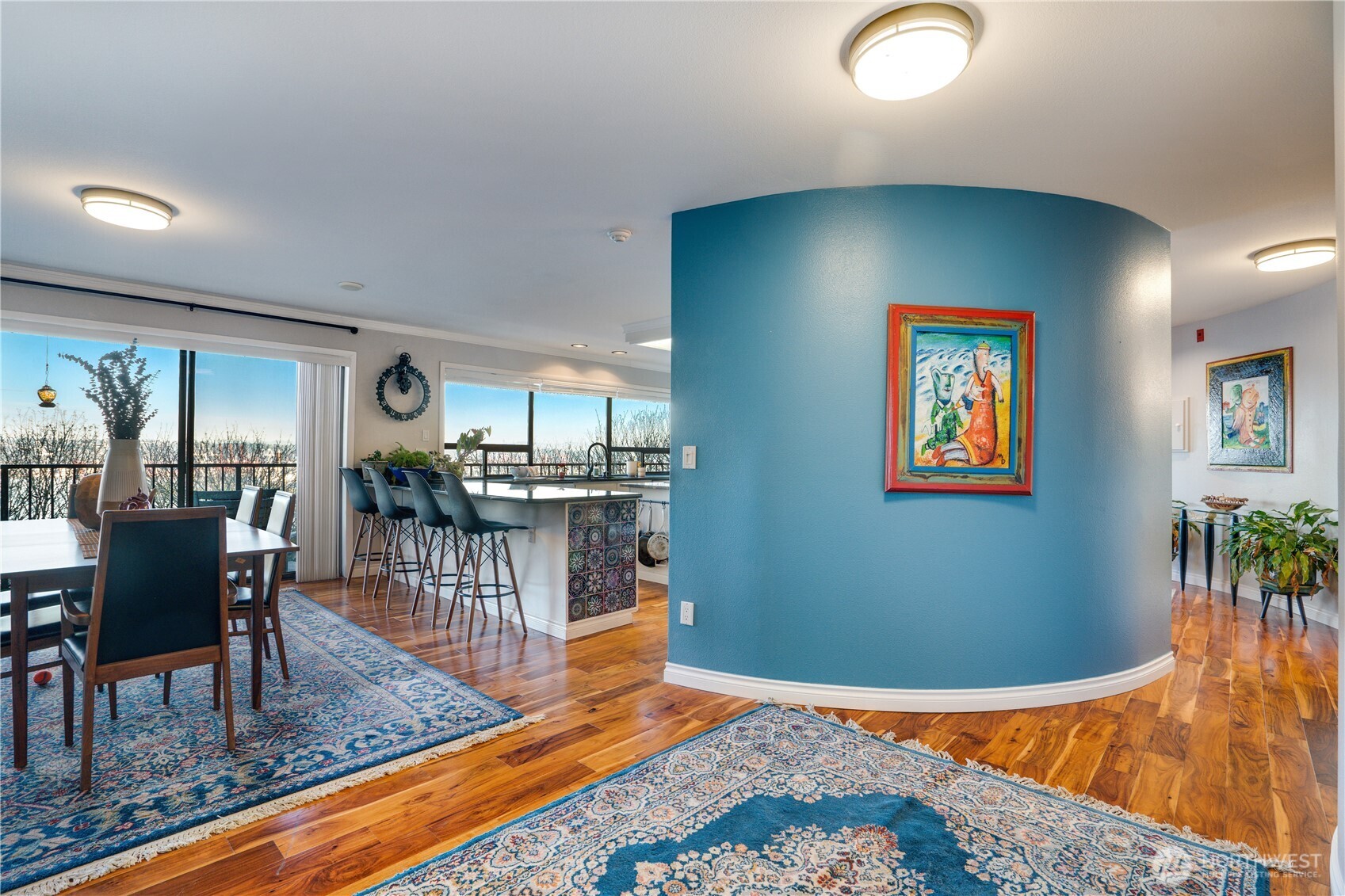 Cool architectural features like this curved wall add graceful visual interest and soft movement to the space.