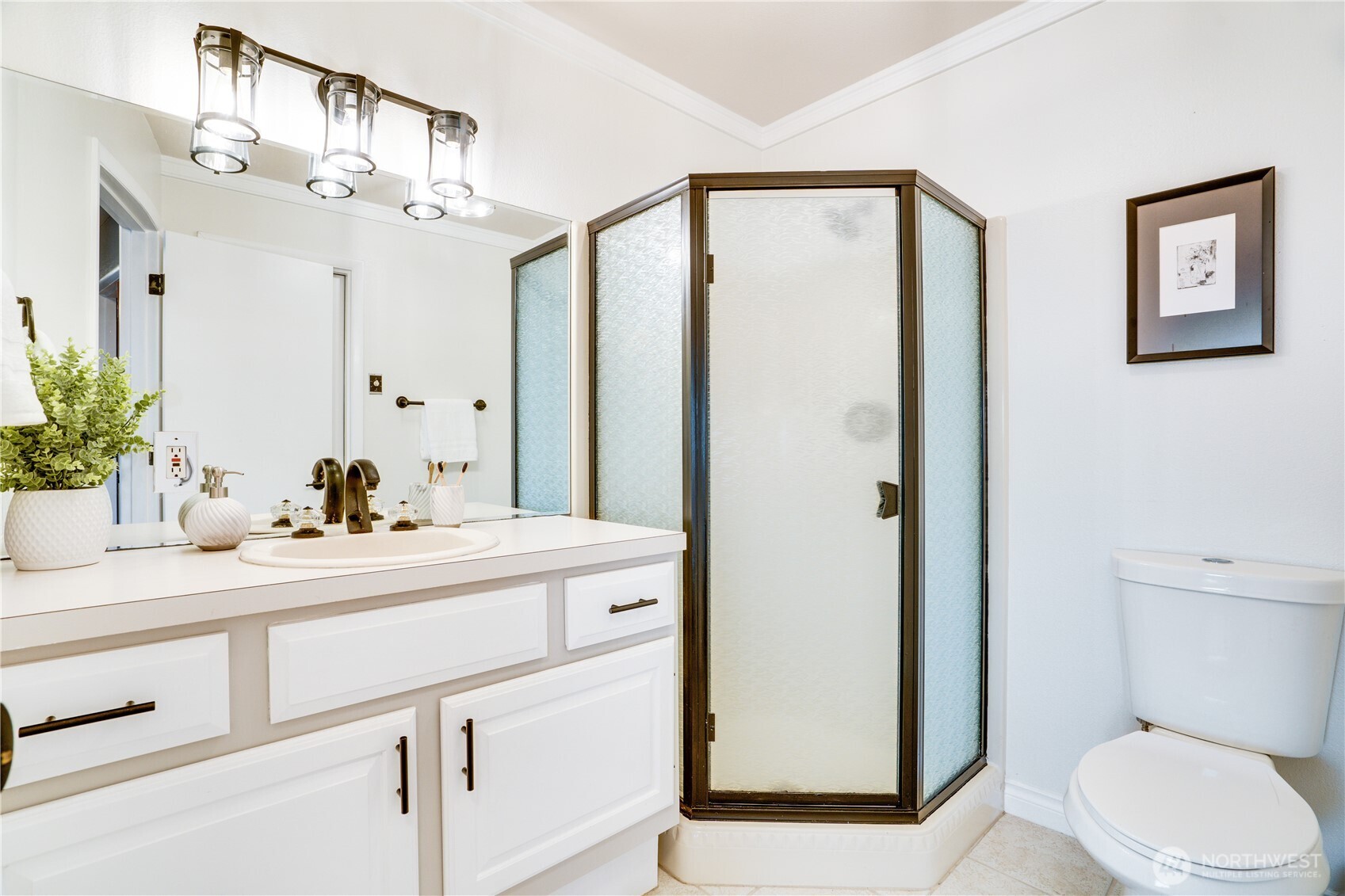 Conveniently located off the main hall, the third bathroom serves guests with ease.