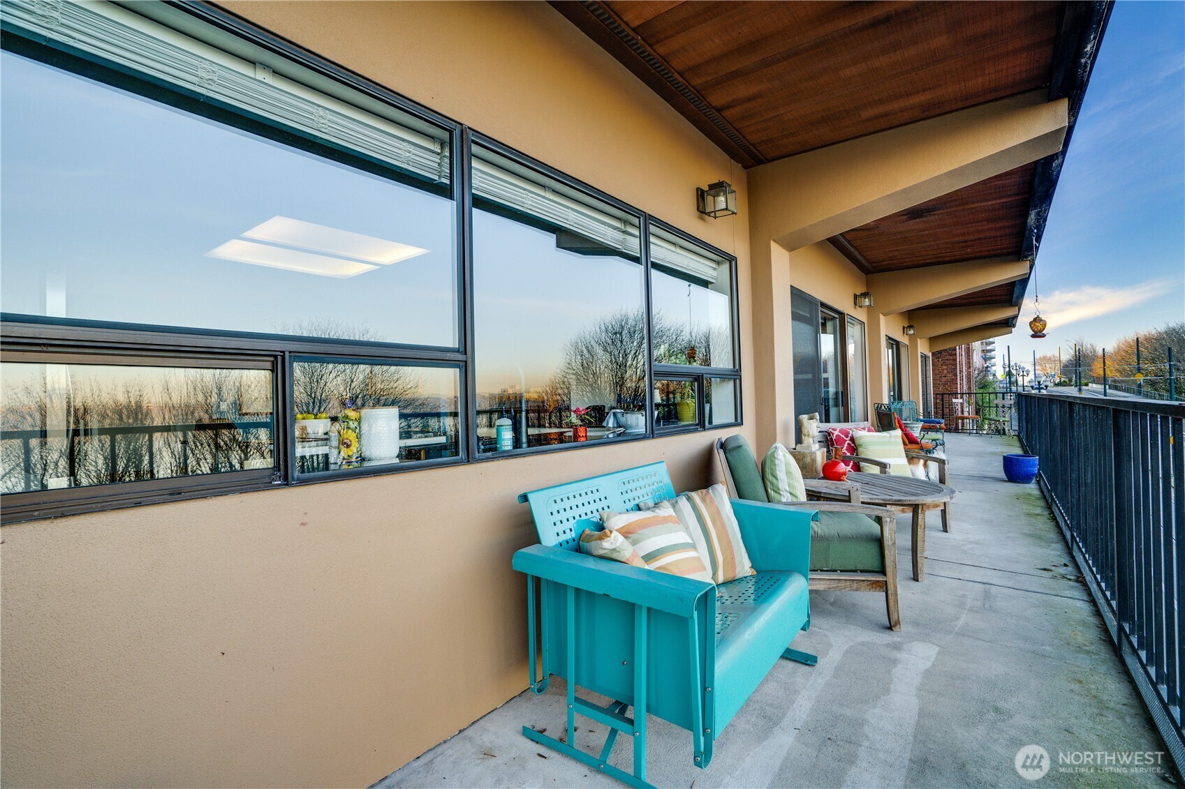 This balcony extends along the whole unit!