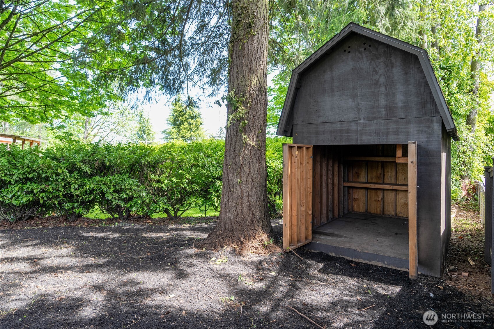 Outbuilding in backyard.