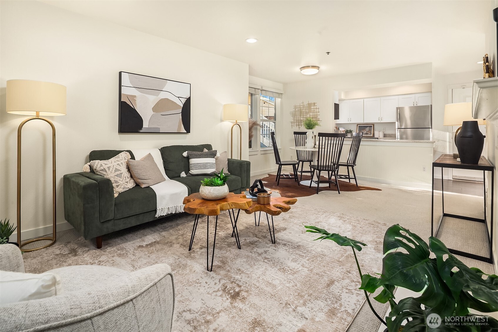 Welcome to this well-appointed corner condo w cozy fireplace and sizable window overlooking the peaceful greenbelt.