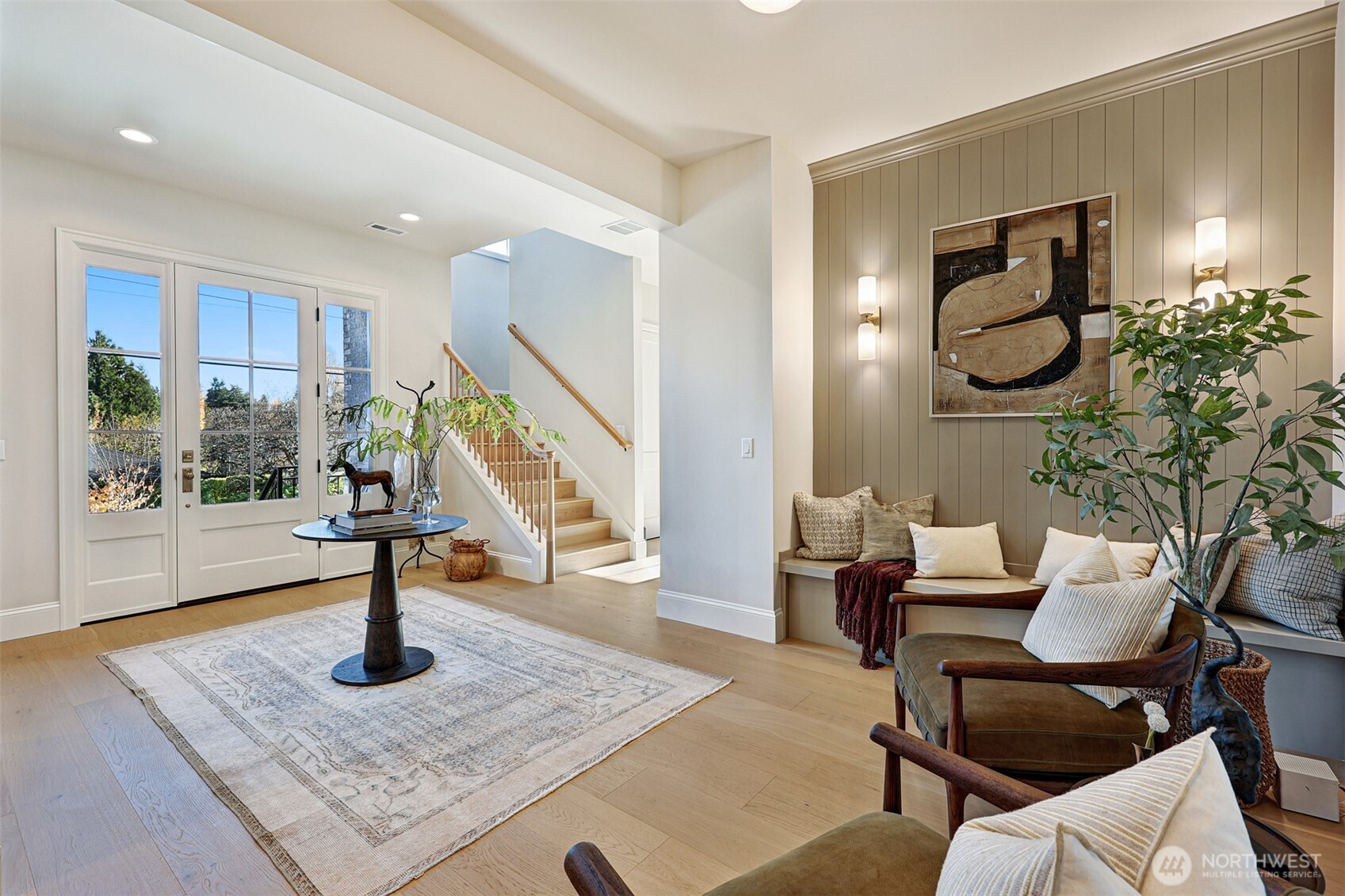 A grand foyer gives you room to greet guests and come in from the rain!