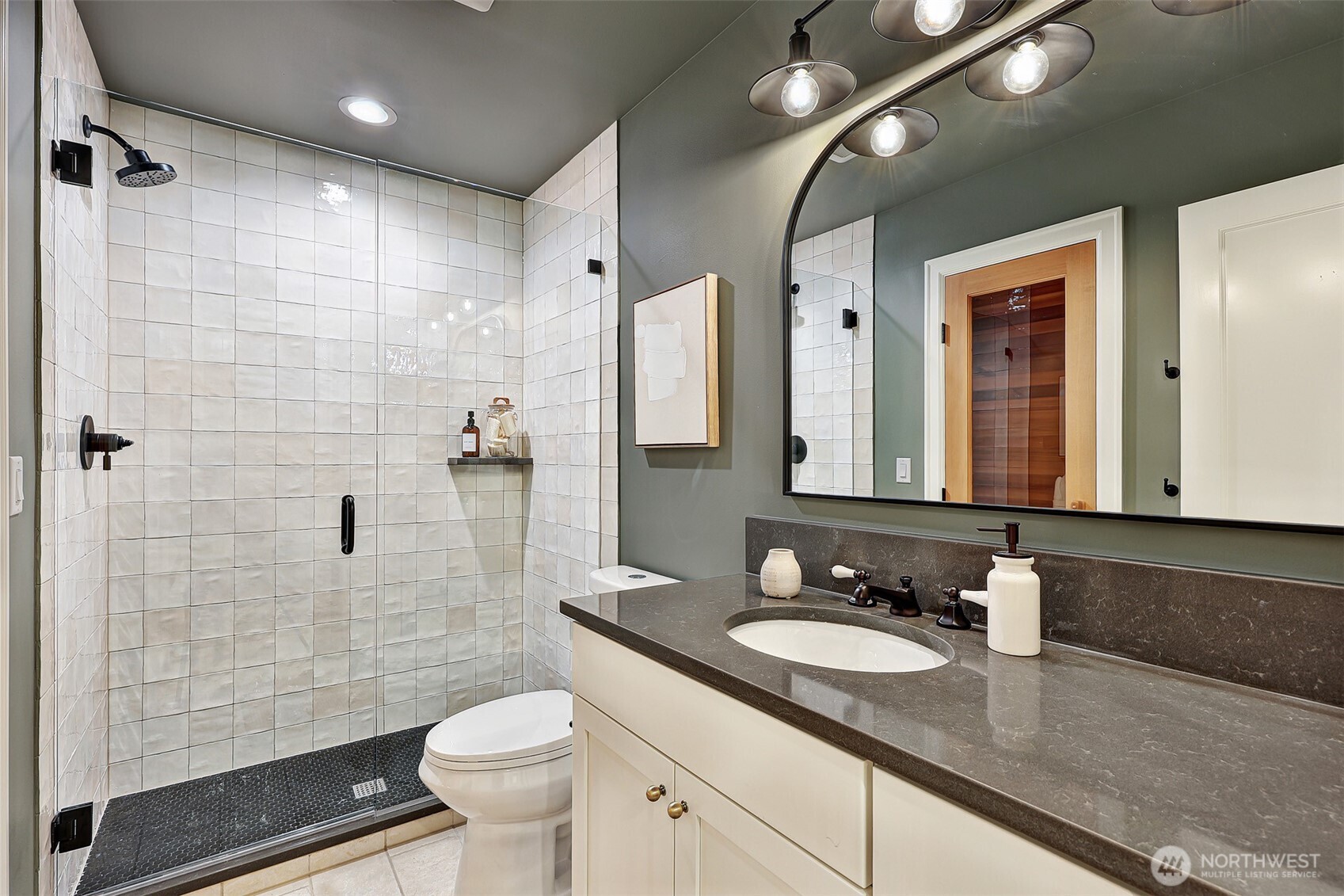 3/4 bath on lower level includes a beautiful sauna.