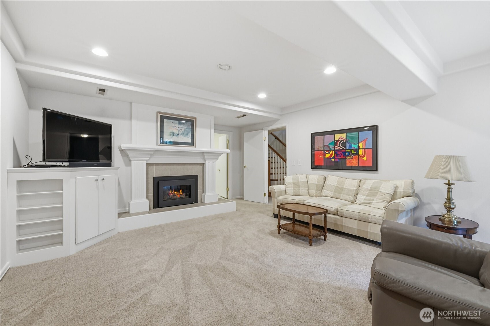 The downstairs in this home is a real game changer and it provides a ton of floorplan flexibility.  The family room is centered around a sweet gas fireplace.  This would be a fabulous tv room and/or maybe even a play room for the young ones.