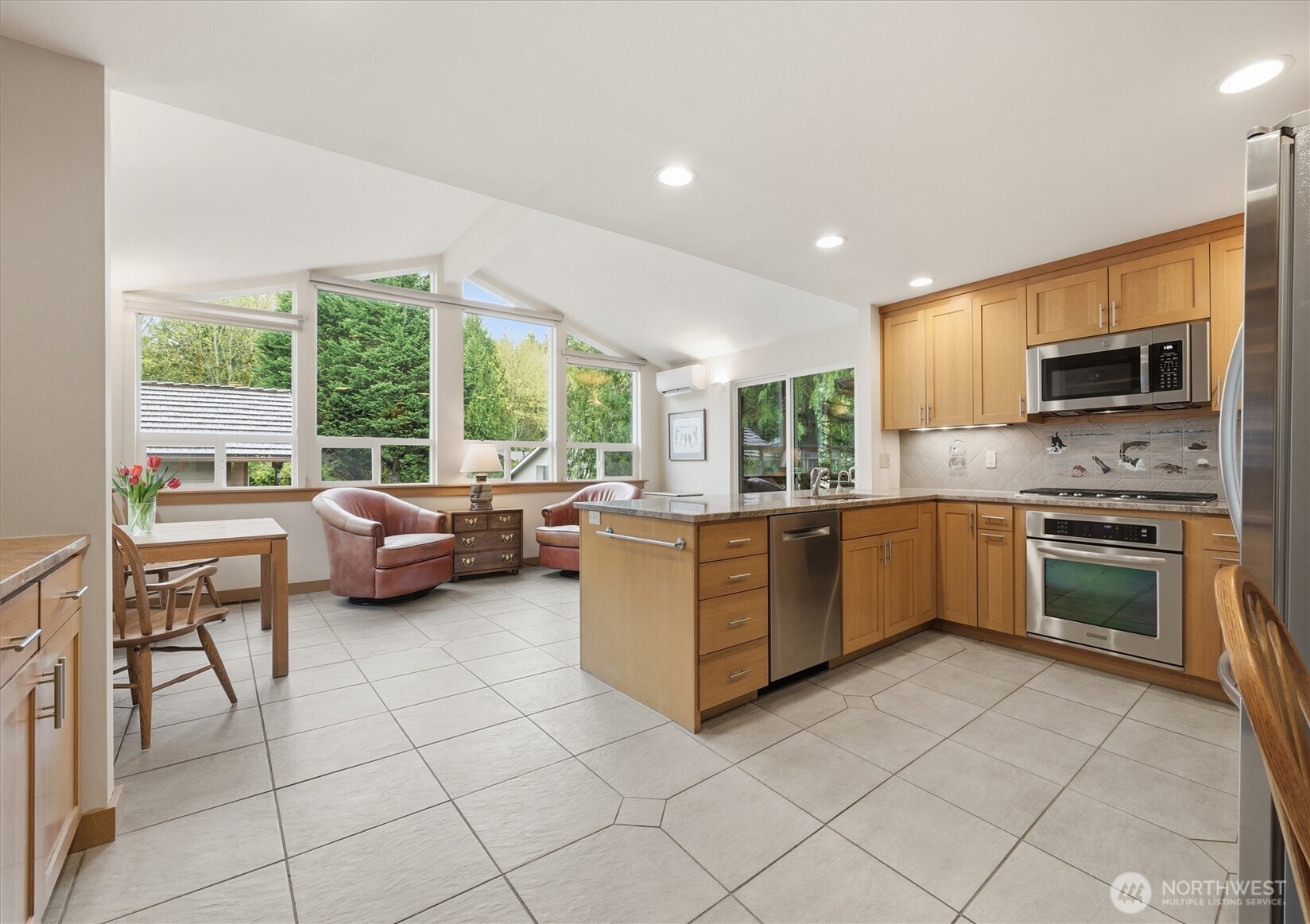 The kitchen is the heart of any home and this one surely impresses.  Expanded in 2009, you will love this great room space; perfect for every day living and entertaining friends.