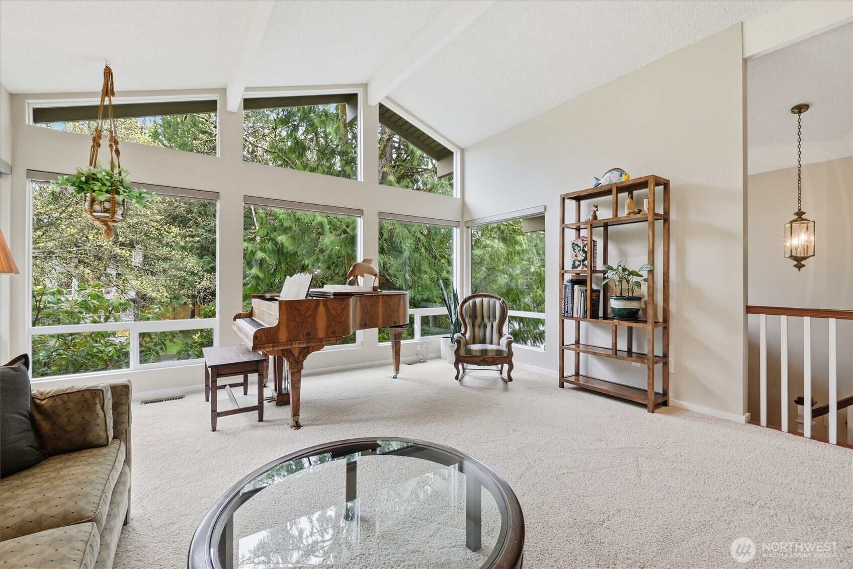 Moving to more formal spaces, here is the formal living room.  Vaulted ceilings and yet more oversized windows highlight this private and serene space.  Keep this formal or make it the perfect family room with plenty of space for your large furniture.