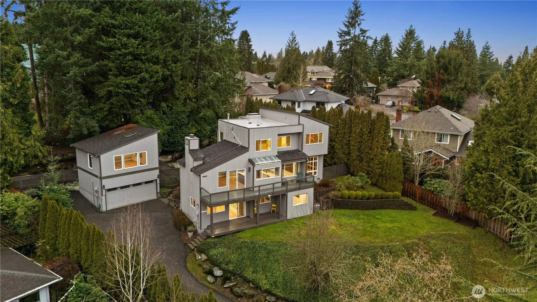 Set in one of Redmond’s most desirable neighborhoods, this elegant view home blends privacy, space, and convenience. Private and separate annex above garage is perf for studio or work from home flex space.