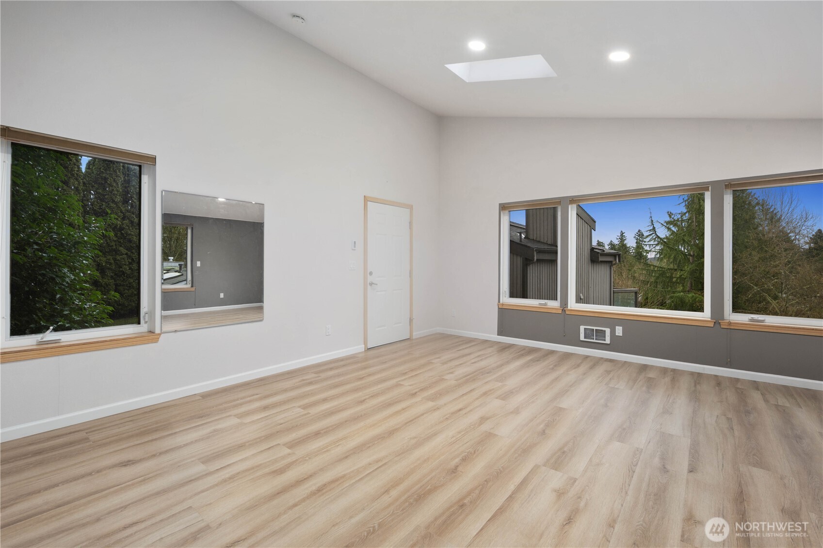 Large, light-filled work/flex space. Recessed lighting, expansive windows, new floors and paint.