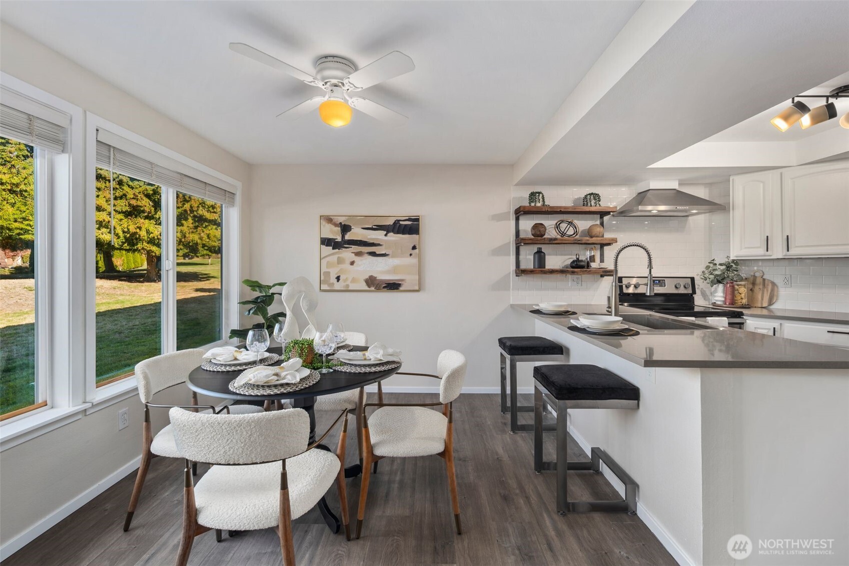 Updated kitchen great for entertaining or peaceful bird watching from your expansive windows.