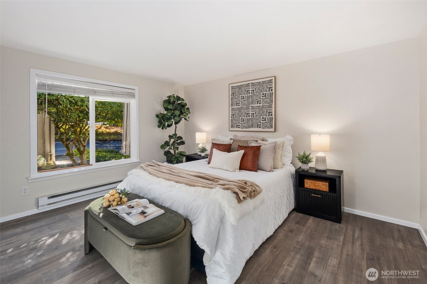 Open primary suite with walk in closet.