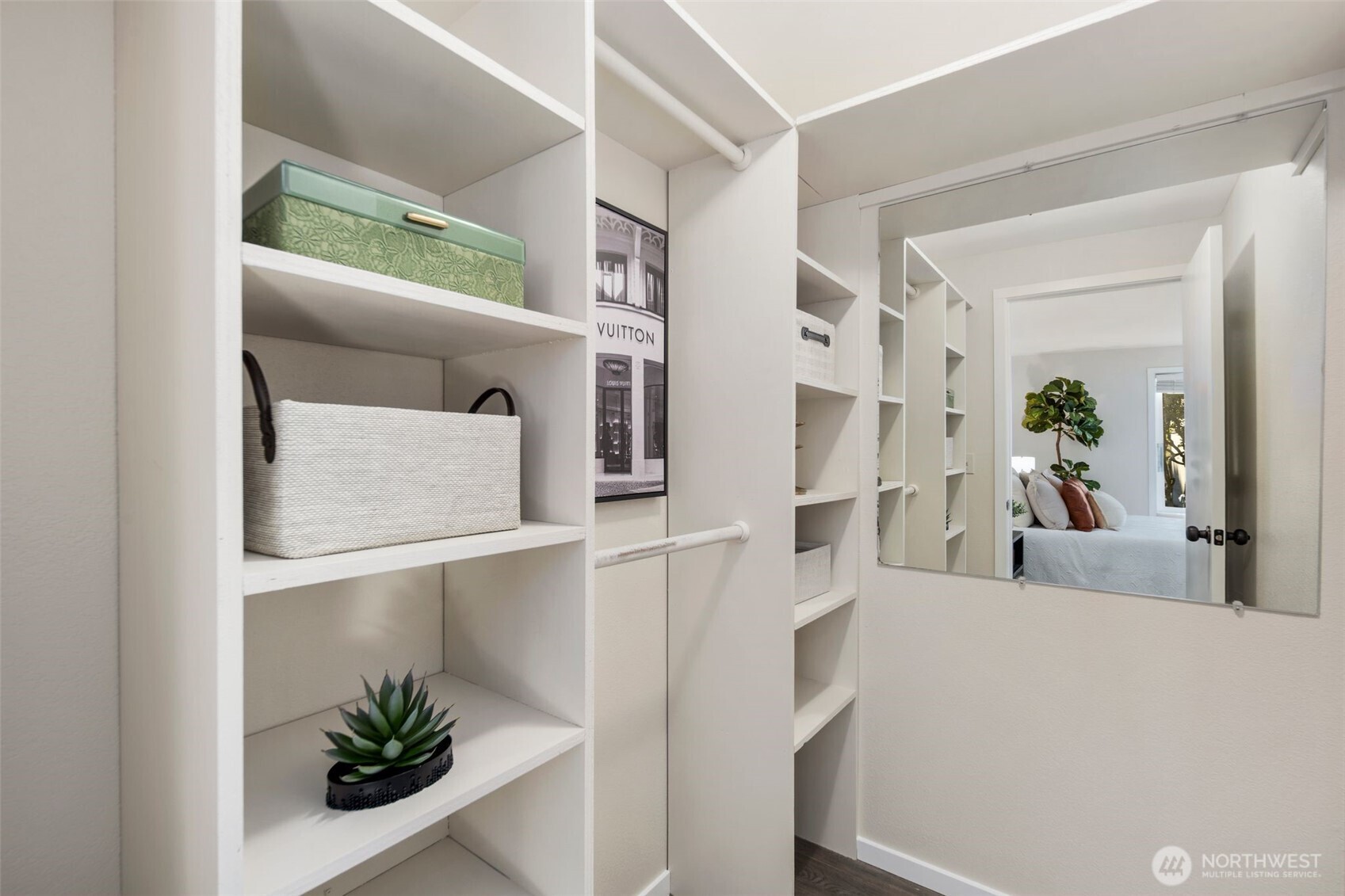 Walk in Primary Closet with extra storage space.