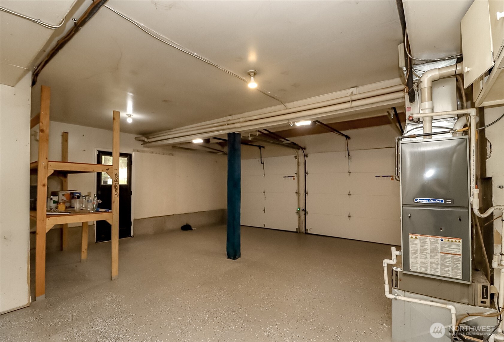 Kitchen features a new refrigerator, dishwasher and microwave