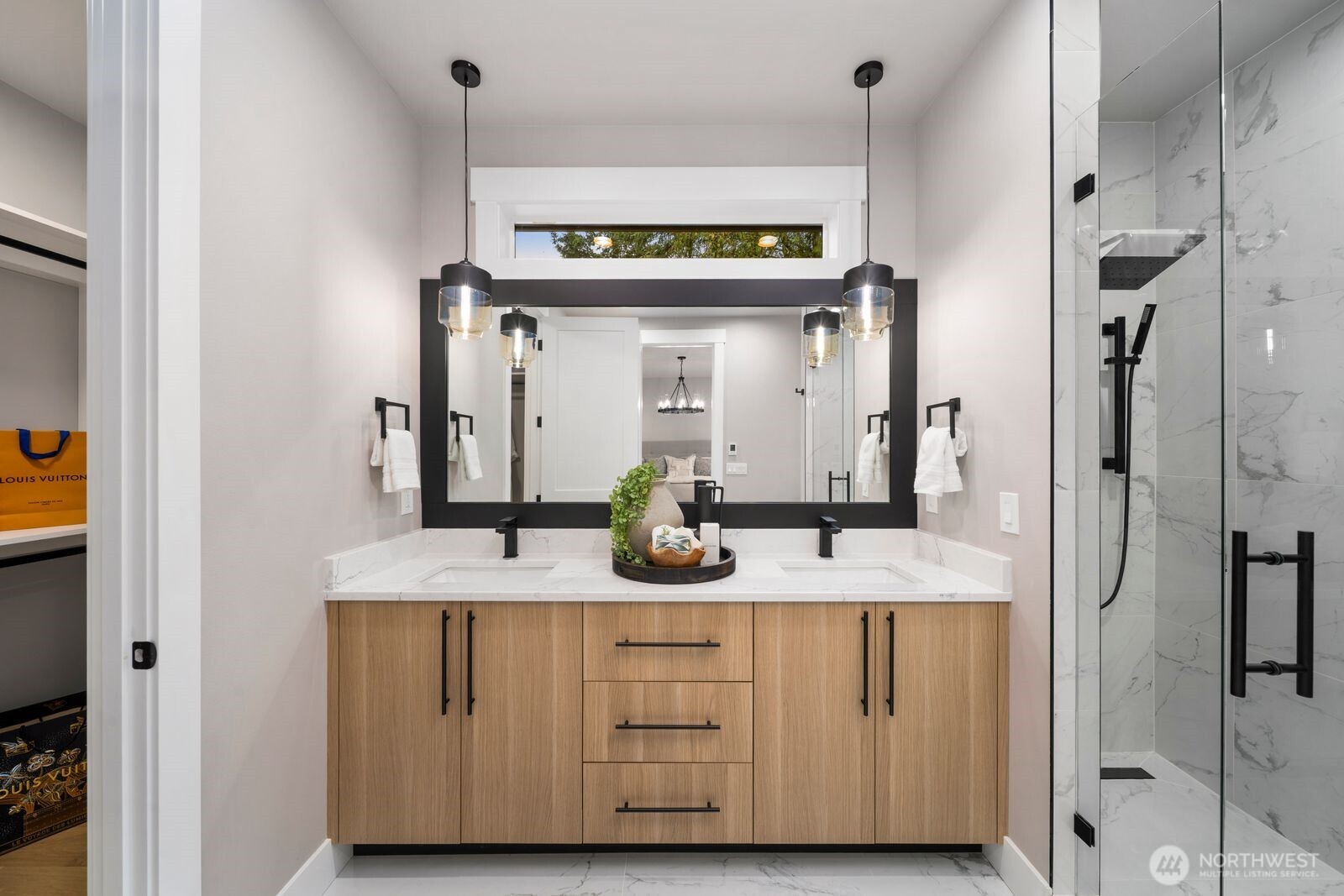 A beautifully designed shower in the primary bath.