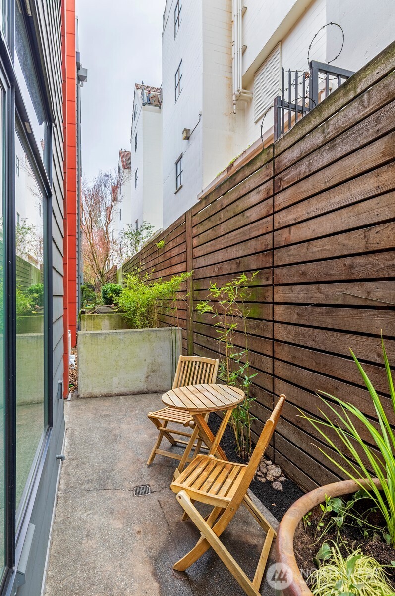 Backyard patio perfect for morning coffee & evening bbq.