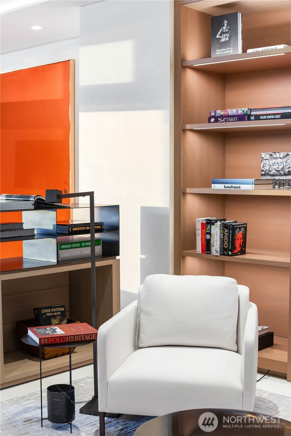 Exquisite, architectural steel and wood built-ins and shelving throughout the home.