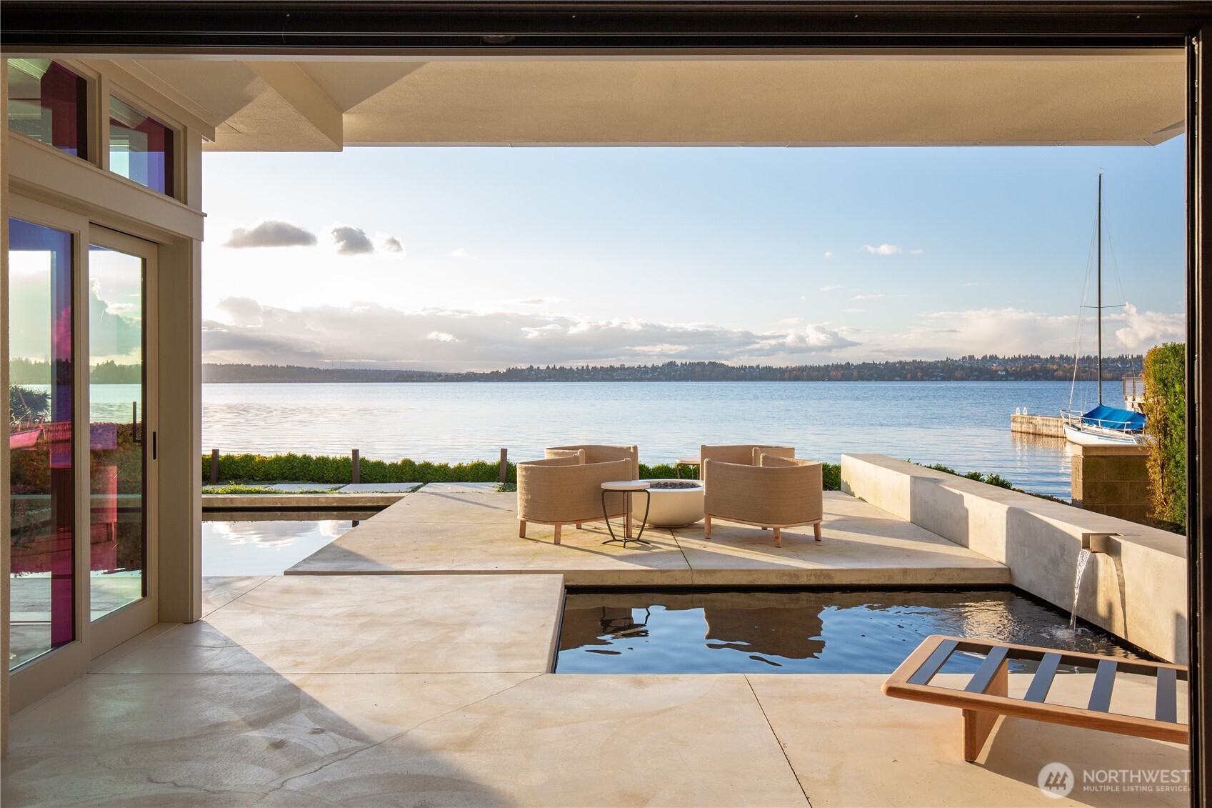 Multiple outdoor patios, built in gas fireplace and seating area..