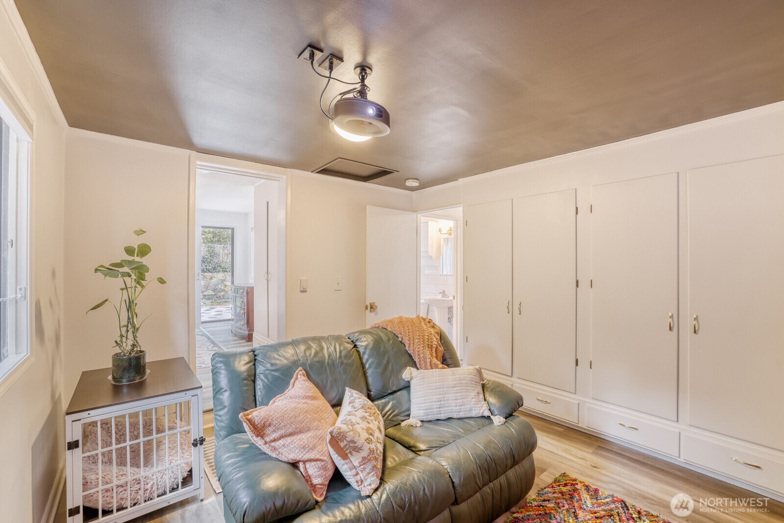 Right off the kitchen for grabbing more popcorn!