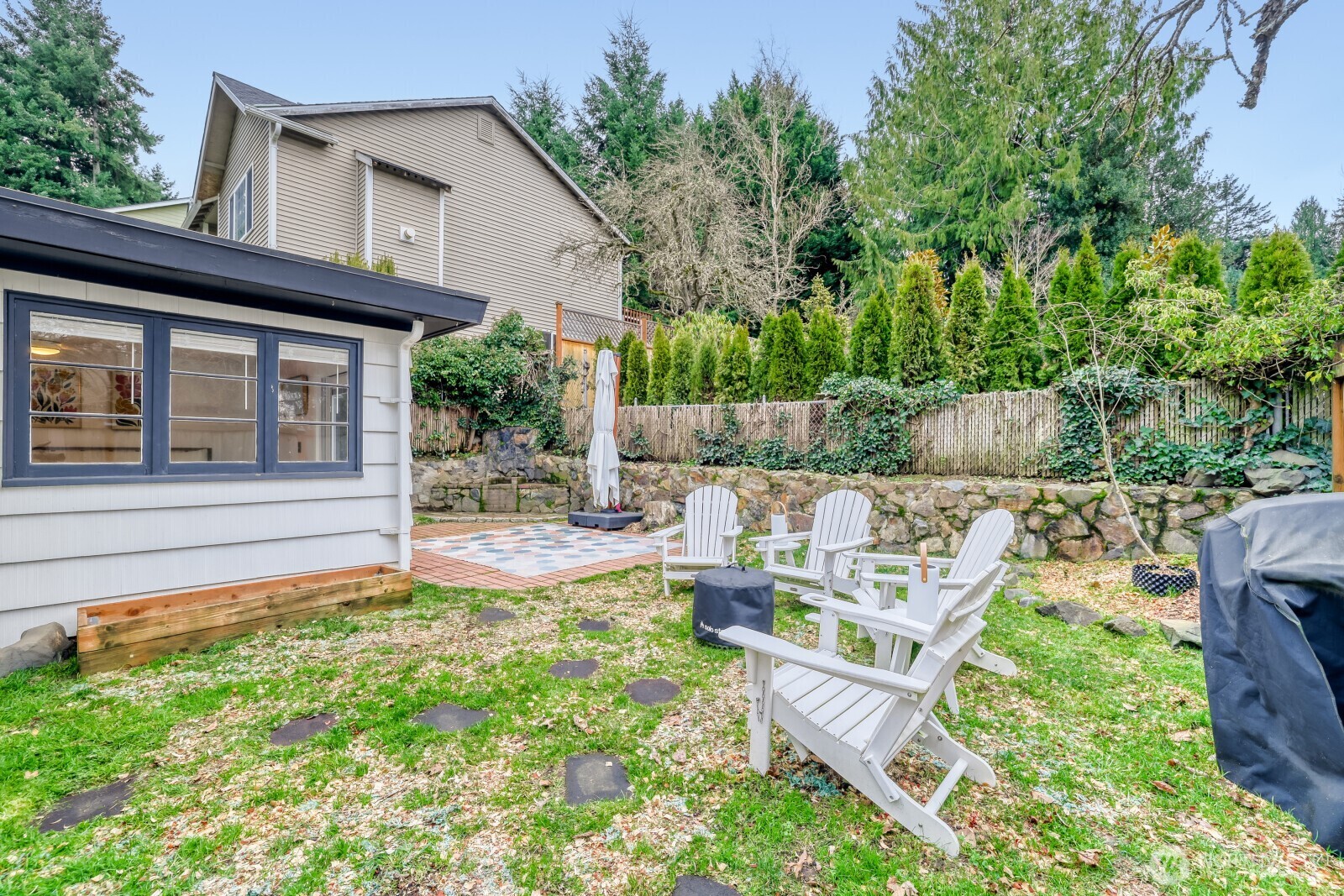 Garden and relax in the cozy backyard.