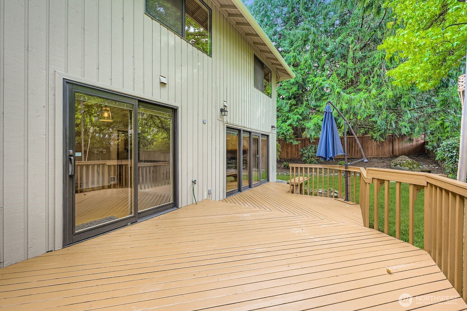 The large deck was just repaired and stained and is in excellent condition, including a built-in bench.