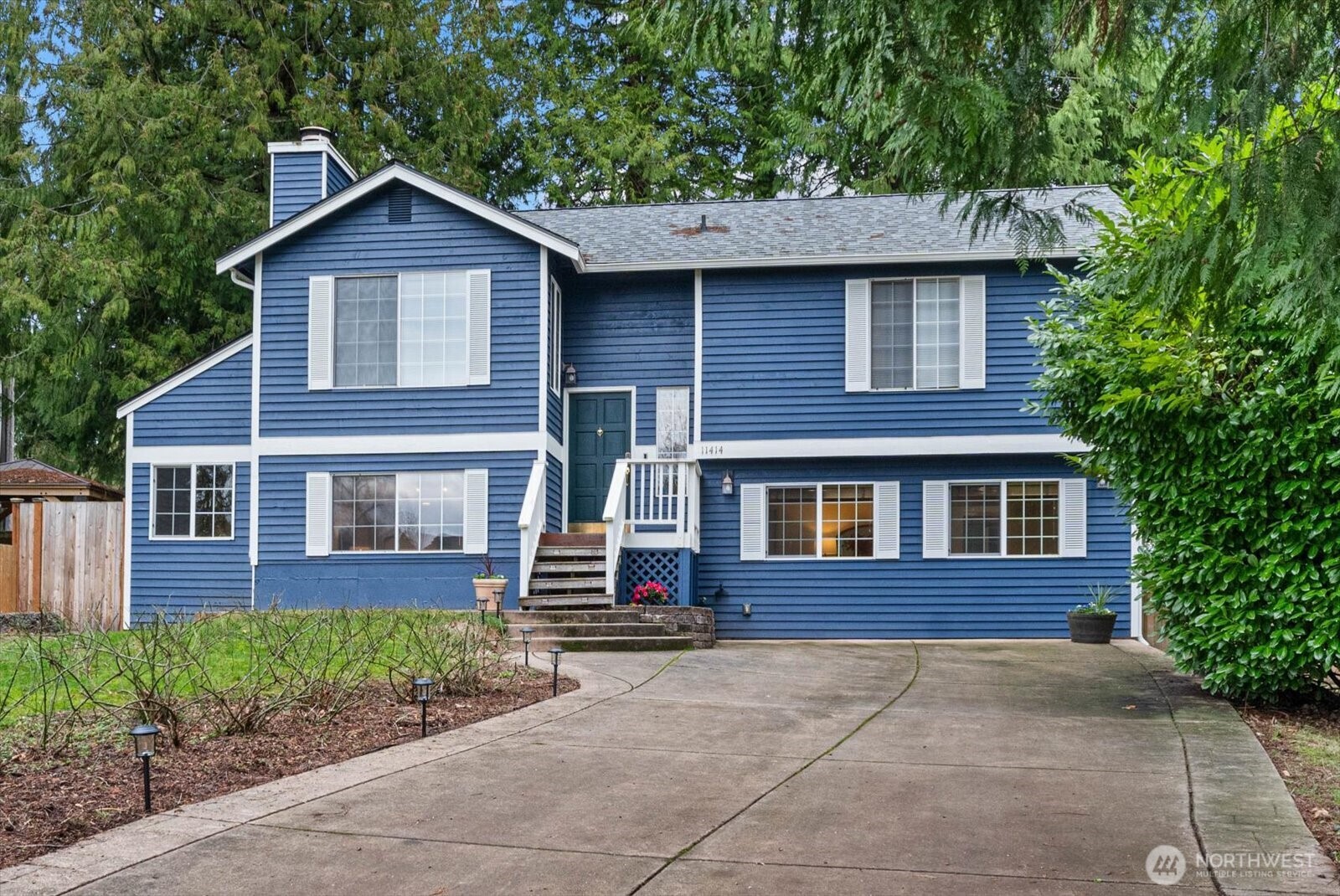 Enjoy rare privacy at 11414 107th Pl. NE, ideally located in one of Kirkland’s most desirable neighborhoods and moments from all its fabulous amenities.
