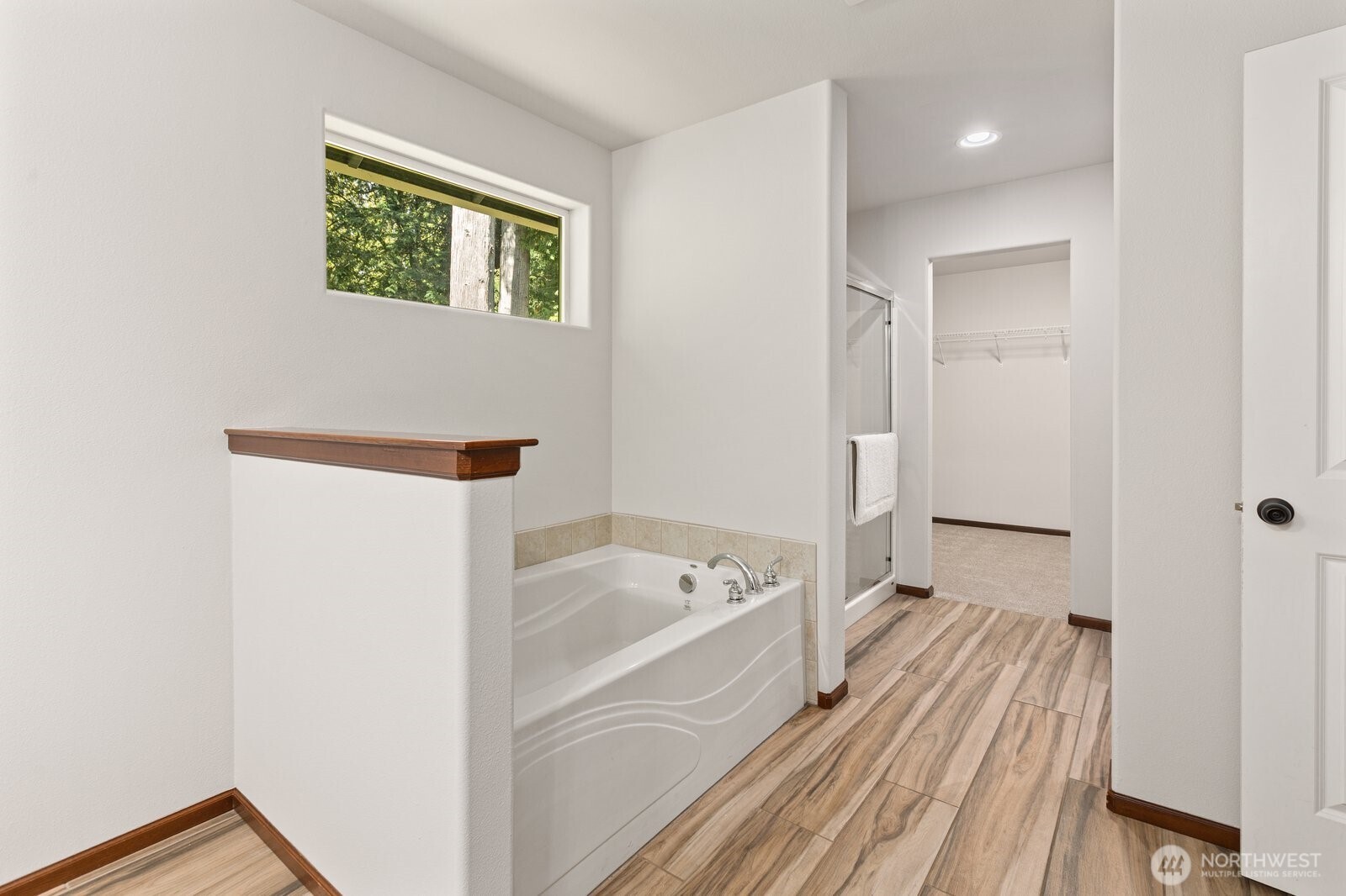 Double vanity sinks in the main bath as well.