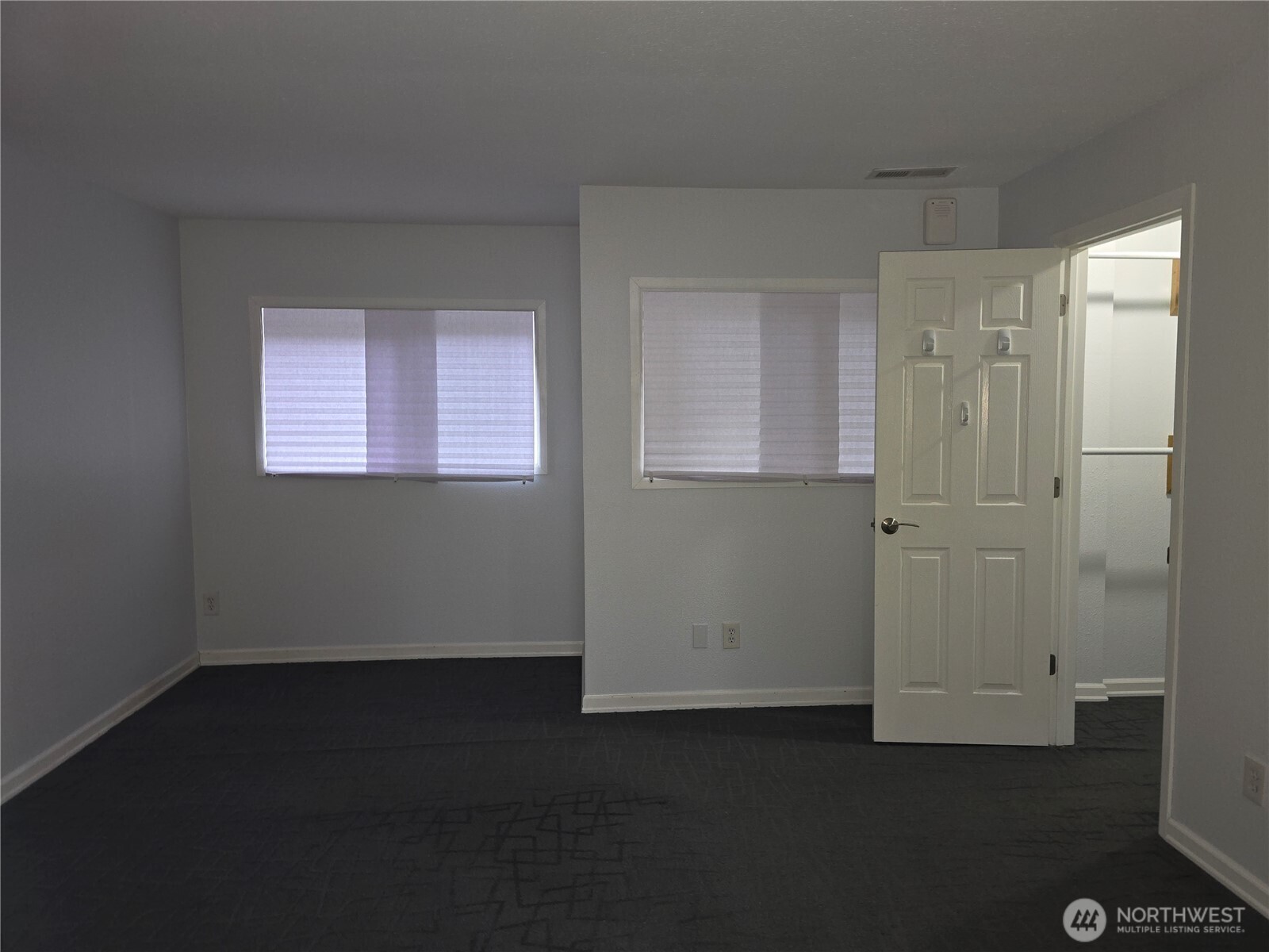 Beauty of an entry, Mirror stays, door enters primary bedroom