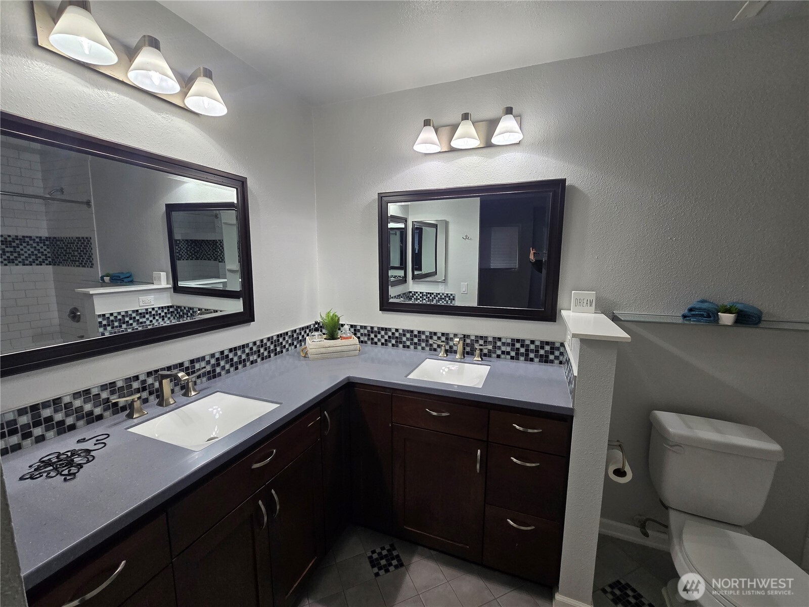 Walk in closet in primary bedroom