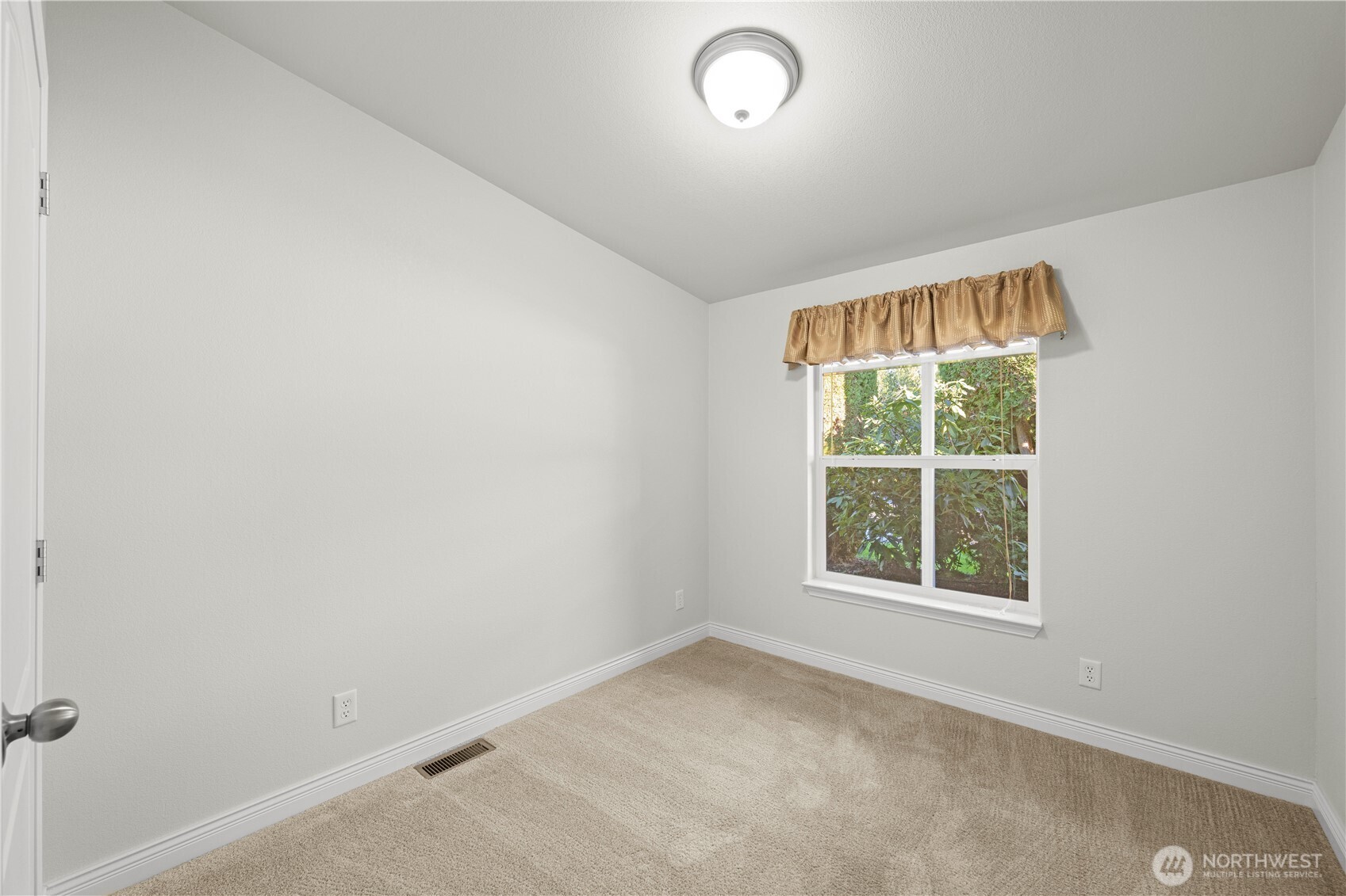 Have friends or family visiting? This inviting guest bedroom provides a comfortable space for them to stay.