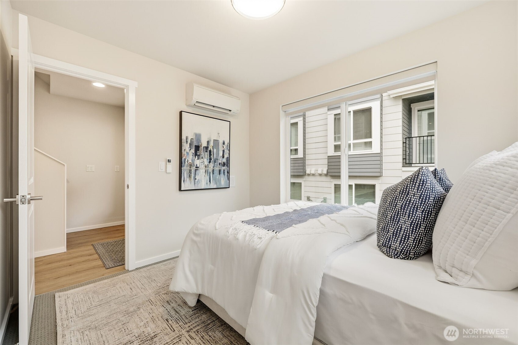 Thoughtfully designed exterior with driveway parking and a 2-car side-by-side garage.