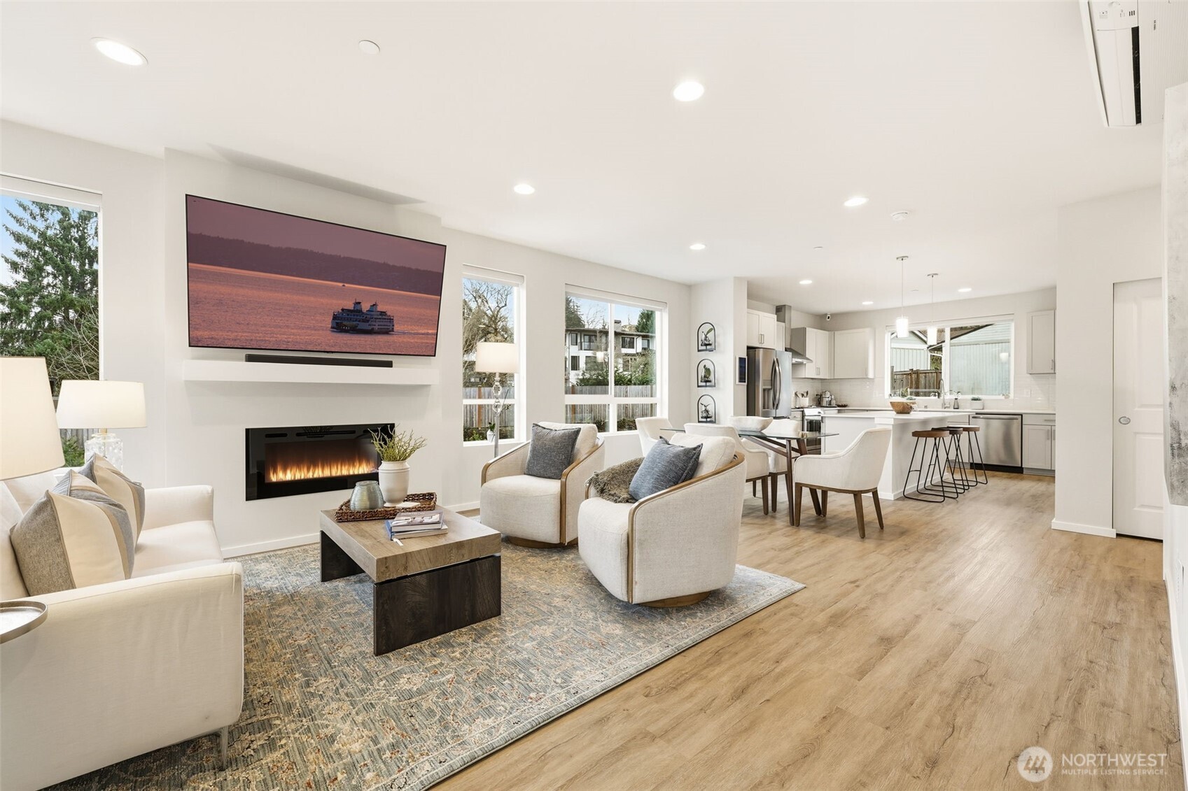 Chef’s kitchen with a quartz island, stainless appliances, and room to gather.