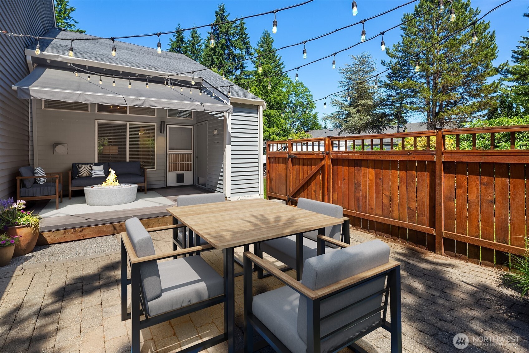 Fantastic deck with Italian lights and expandable awning to allow you comfort during the Summer.  Perfect for entertaining as it gives you your own sun space outside to enjoy those amazing days of sunshine.  Virtually staged with furniture.