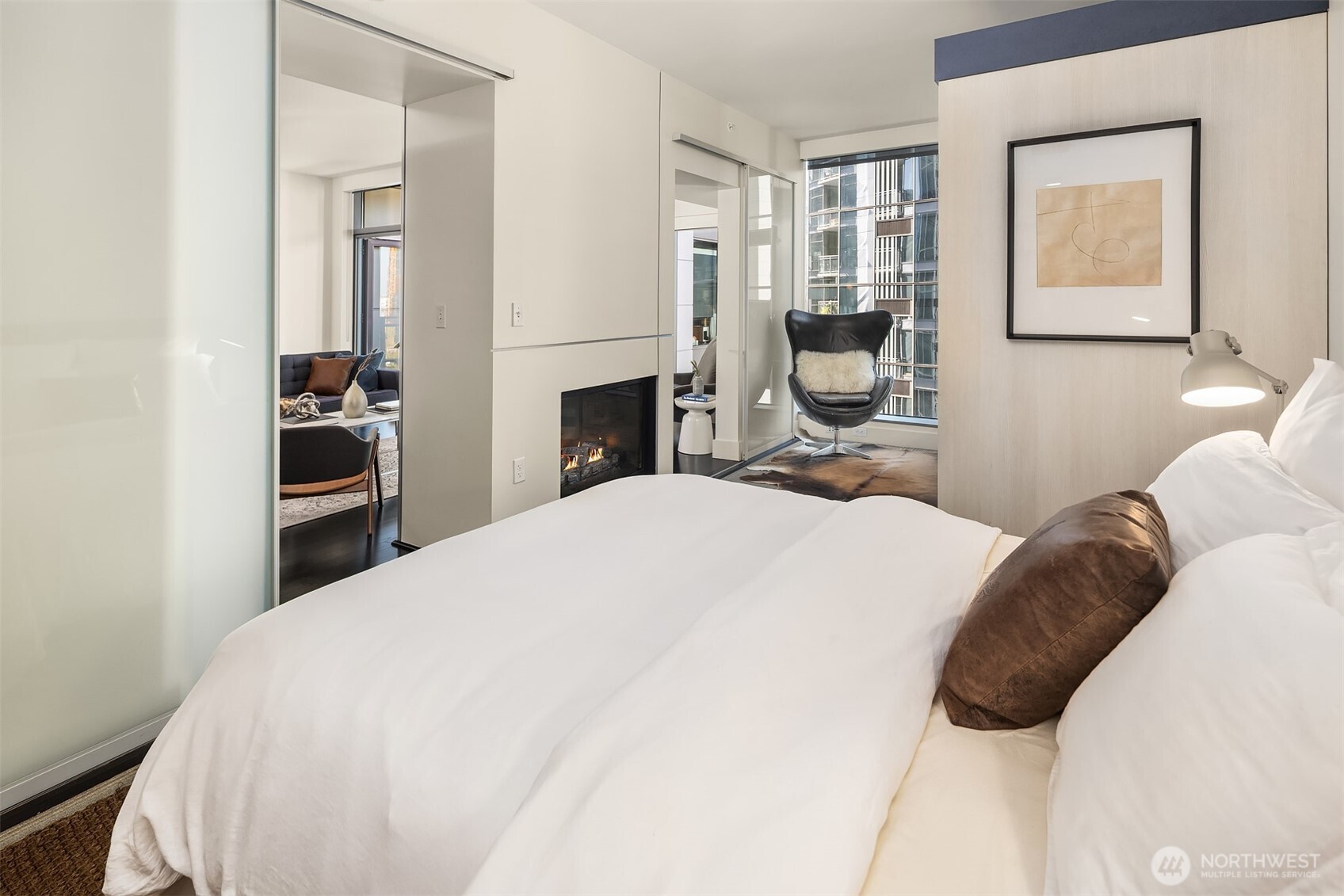 Fireplace opens to both living room and bedroom